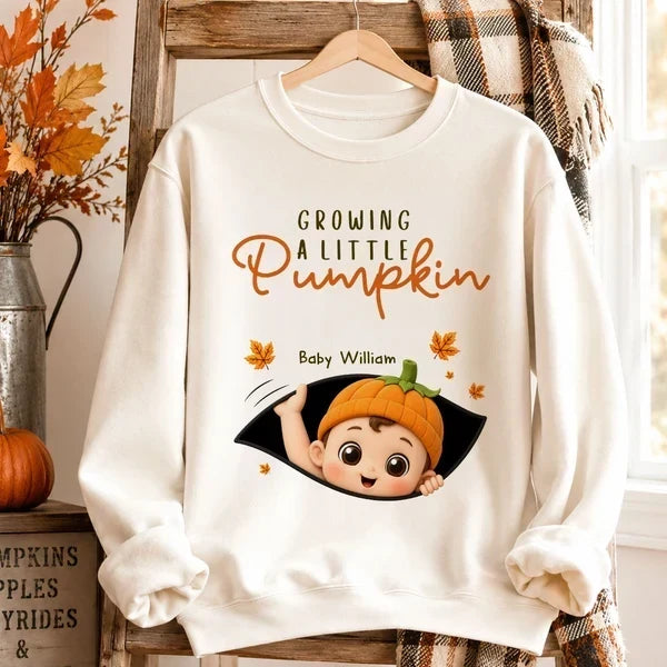 Personalized Baby Pumpkin Sweatshirt, Mom Cradling Baby Bump, Creative Autumn Gift for Mom-to-Be